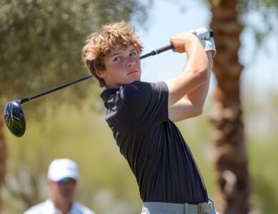 A rising star in the 2025 PGA Golf Tournaments, captured mid-swing on the fairway with a determined look.